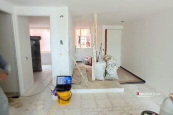 Proyecto de remodelación de apartamento ejecutado por Francisco Cruz Interiores con acabados contemporáneos.